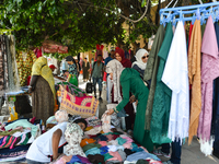 People seen on the street market making their purchases ahead of Laylat al-Qadr celebrations in Rabat, Morocco, on 21 June 2017.  
Laylat al...