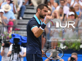 Marin Cilic of Croatia celebrates during the mens singles second round match against Stefan Kozlov of The United States on day four of the 2...