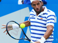Feliciano Lopez ESP against Jeremy Chardy (FRA) during Men's Singles Round Two match on the fourth day of the ATP Aegon Championships at the...