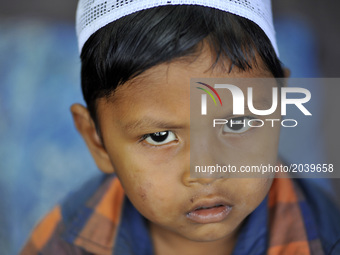 A Portrait of Nepalese Muslim kid offering last Friday of Ramadan's Ritual Prayer at Nepali Jame mosque at Kathmandu, Nepal on Friday, June...