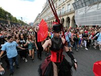 People take part in the annual Gay Pride homosexual, bisexual and transgender visibility march on June 24, 2017 in Paris. (