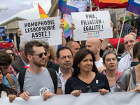 Paris' Mayor Anne Hidalgo (C) march during Gay Pride 2015 in Paris, on June 24th 2017. 2017 marks the 40th anniversary of the first Gay Prid...
