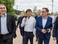 Mayor of the 4th district of Lyon David Kimelfeld (R) and French Minister of Ecological and Inclusive Transition Nicolas Hulot (C) during th...