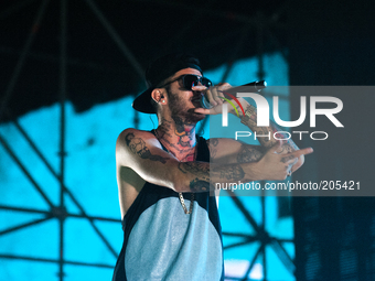 Italian rapper Emis Killa performs at Castello a Mare, in Palermo, on Aug. 03, 2014 (