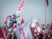 Thousands of supporters cheer and wave flags while listening to Turkey's main opposition Republican People's Party (CHP) leader Kemal Kilicd...