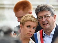 La France Insoumise (LFI) leftist party's parliamentary group president Jean-Luc Melenchon (R) and Clementine Autain  attend a demonstration...