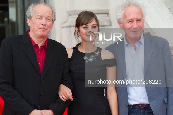 (L-R) - Director Jean-Pierre Dardenne, French actress Marion Cotillard and Director Luc Dardenne attend the Premiere of their movie 'One Day...