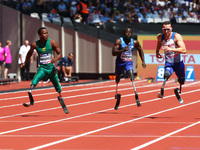 L-R Leon Schaefer (GER) ,Ntando Mahlangu (RSA),rEGAS wOODS SR (USA)Richard Whitehead of Great Britain and Apj Yodha Pedige (SRI) Men's 100m...
