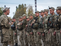 Pro-Ukraine soldiers line up at a military base in Kramatorsk, Ukraine, on 4 October, 2016. (Photo by Diego Cupolo/NurPhoto)