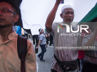 A protest outside U.S. Embassy in Kuala Lumpur, Malaysia on Friday, July 21, 2017. A Malaysian Muslim non-governmental organization (NGO) ga...