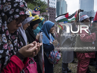 A protest outside U.S. Embassy in Kuala Lumpur, Malaysia on Friday, July 21, 2017. A Malaysian Muslim non-governmental organization (NGO) ga...