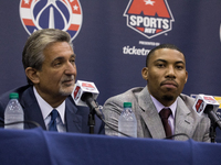 (L-R), Washington Wizards owner Ted Leonsis, and player Otto Porter, participated in a press conference to celebrate Otto Porter's new contr...