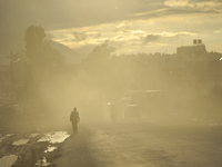 A man walks through mass of dust and air pollution at Patan, Nepal on Saturday, July 22, 2017. Kathmandu has been ranked as the third most p...