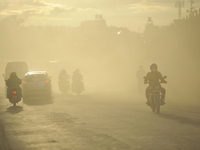 Bikers travelling through mass of dust and air pollution at Patan, Nepal on Saturday, July 22, 2017. Kathmandu has been ranked as the third...
