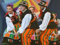 Members of 'Kukuleczka' group from Perth, Australia, during their performance on the first day of the 17th edition of World Festival of Poli...