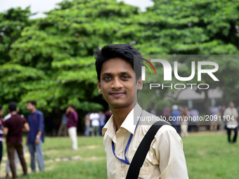 Bangladeshi collage students walking on the collage ground at class break time in Dhaka city, Bangladesh. On July 23, 2017 (