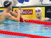 James Guy from Great Britain and Yang Sunn of China react after the men's 200m free style pre-runs during the FINA World Championships 2017...