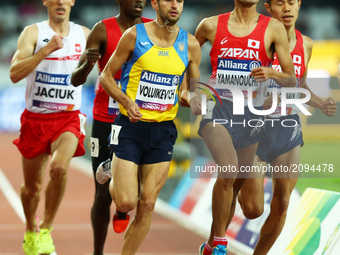L-R Pavio Voluikevych of Ukraine and Yusuke Yamanouchi of Japen compete of Men's 1500m T20 Final during World Para Athletics Championships D...