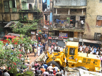  Local people and Member of Disaster Management Group (DMG) worked during house collapsed during the Heavy Rain  at 10, Indian Mirror Street...