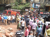  Local people and Member of Disaster Management Group (DMG) worked during house collapsed during the Heavy Rain  at 10, Indian Mirror Street...