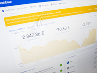 A price charts of Bitcoin on a Coinbase web platform. Bitcoin is a cryptocurrency and a digital payment system invented by an unknown progra...