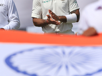 Indian cricket captain Virat Kholi claps before the play started on 1st Day's in the 1st Test match between Sri Lanka and India at the Galle...