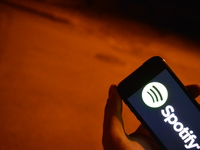 In this photo illustration, the logo of the music streaming service Spotify is displayed on a smart phone in Ankara, Turkey on August 02, 20...