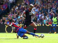 Crystal Palace's Timothy Fosu-Mensah tackles Huddersfield Town's Steve Mounie
during Premier League  match between Crystal Palace and Hudder...