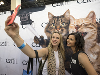Sara and Amy Sheptycki take a selfie at CatCon, a convention for cat lovers in Pasadena, California on August 12, 2017. The two-day event in...
