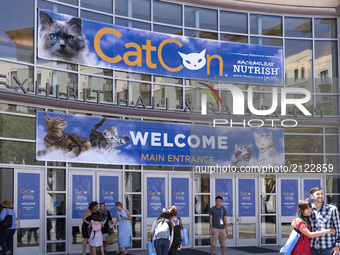 Fans arrive at the third annual CatCon, a convention for cat lovers in Pasadena, California on August 12, 2017. The two-day event includes m...