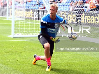 Huddersfield Town's Jonas Lossl during the pre-match warm-up 
during Premier League  match between Crystal Palace and Huddersfield Town at S...