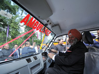 Indian Ambassador to Nepal Manjeev Singh Puri observes Ambulance after cuts the ribbon to give 30 Ambulances & 6 buses to hospitals at the E...
