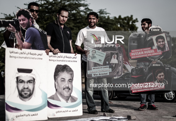 Bahrain , Duraz - photographers demanding to free detainee photographers , opposition demonstration calling for more rights and democracy on...
