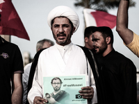 Bahrain , Duraz - Secertary-General of AlWefaq Political society Sh. Ali Salman taking a part during a sit in with detainee photographers an...