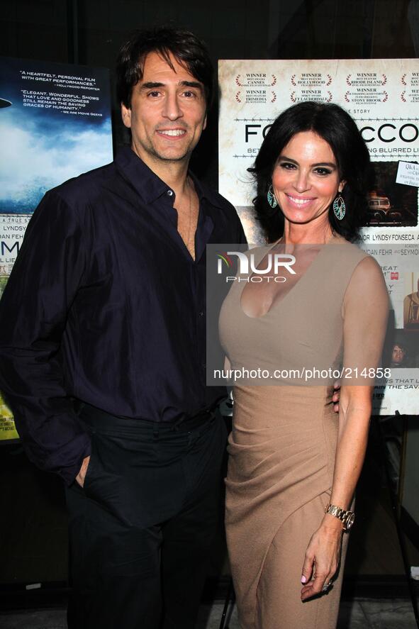 BEVERLY HILLS - AUGUST 15: Vincent Spano, Betsy Russell at 