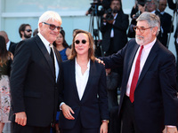 Ricky Tognazzi, Celine Sciamma and John Landis walks the red carpet ahead of the 'Downsizing' screening and Opening Ceremony during the 74th...