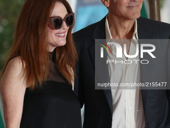 George Clooney and Julianne Moore arrive at the Hotel Excelsior in Venice, Italy, on September 1, 2017. (