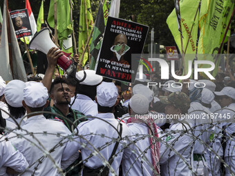Group of some Indonesian Organization held demonstration in front of Myanmar Embassy with total 10,000 of demonstrant, in Jakarta, Indonesia...