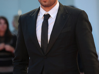 Matthias Schoenaerts walks the red carpet ahead of the 'Racer And The Jailbird (Le Fidele)' screening during the 74th Venice Film Festival o...