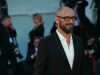 Michael Roskam walks the red carpet ahead of the 'Racer And The Jailbird (Le Fidele)' screening during the 74th Venice Film Festival on Sept...
