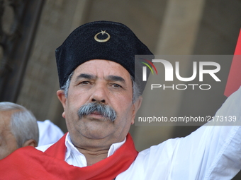 A man poses for a picture during a march marking the 94th anniversary of the main opposition Republican People's Party (CHP) at Anitkabir, t...