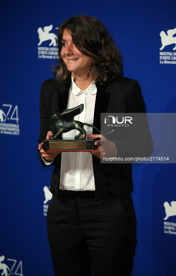 Producer Valentina Novati poses with the Special Orizzonti Jury Prize Award for 'Caniba' on behalf of Verena Paravel at the Award Winners ph...