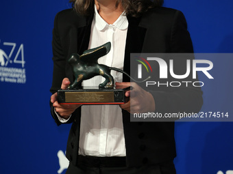 Producer Valentina Novati poses with the Special Orizzonti Jury Prize Award for 'Caniba' on behalf of Verena Paravel at the Award Winners ph...