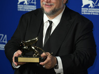 Guillermo del Toro poses with the Golden Lion for Best Film Award for 'The Shape Of Water' at the Award Winners photocall during the 74th Ve...