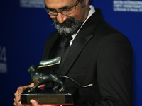 Vahid Jalilvand wins Orizzonti prize for the Best Direction with the movie 'Bedoune Tarikh, Bedoune Emza (no date, no signature)' during Cer...