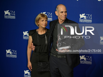Laura Maoz and Samuel Maoz pose with the Silver Lion - Grand Jury Prize Award for 'Foxtrot' at the Award Winners photocall during the 74th V...