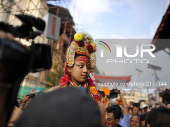 Devotees carrying God Bhairab for the chariot pulling festival on the last day of Indra Jatra Festival celebrated in Basantapur Durbar Squar...
