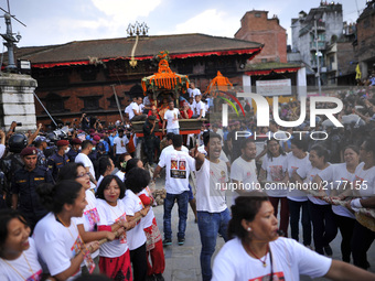 Nepalese Women devotees pulling the chariot of Ganesh on the last day of Indra Jatra Festival celebrated in Basantapur Durbar Square, Kathma...