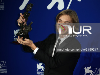 Venice, Italy. 09 September, 2017.  Charlie Plummer poses with the 'Marcello Mastroianni' Award for Best New Young Actor or Actress for 'Lea...