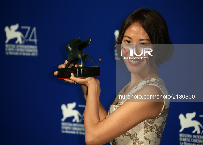 Venice, Italy. 09 September, 2017.  Gina Kim poses with the Best VR Experience Award for 'La Camera Insabbiata' co-directed with Laurie Ande...